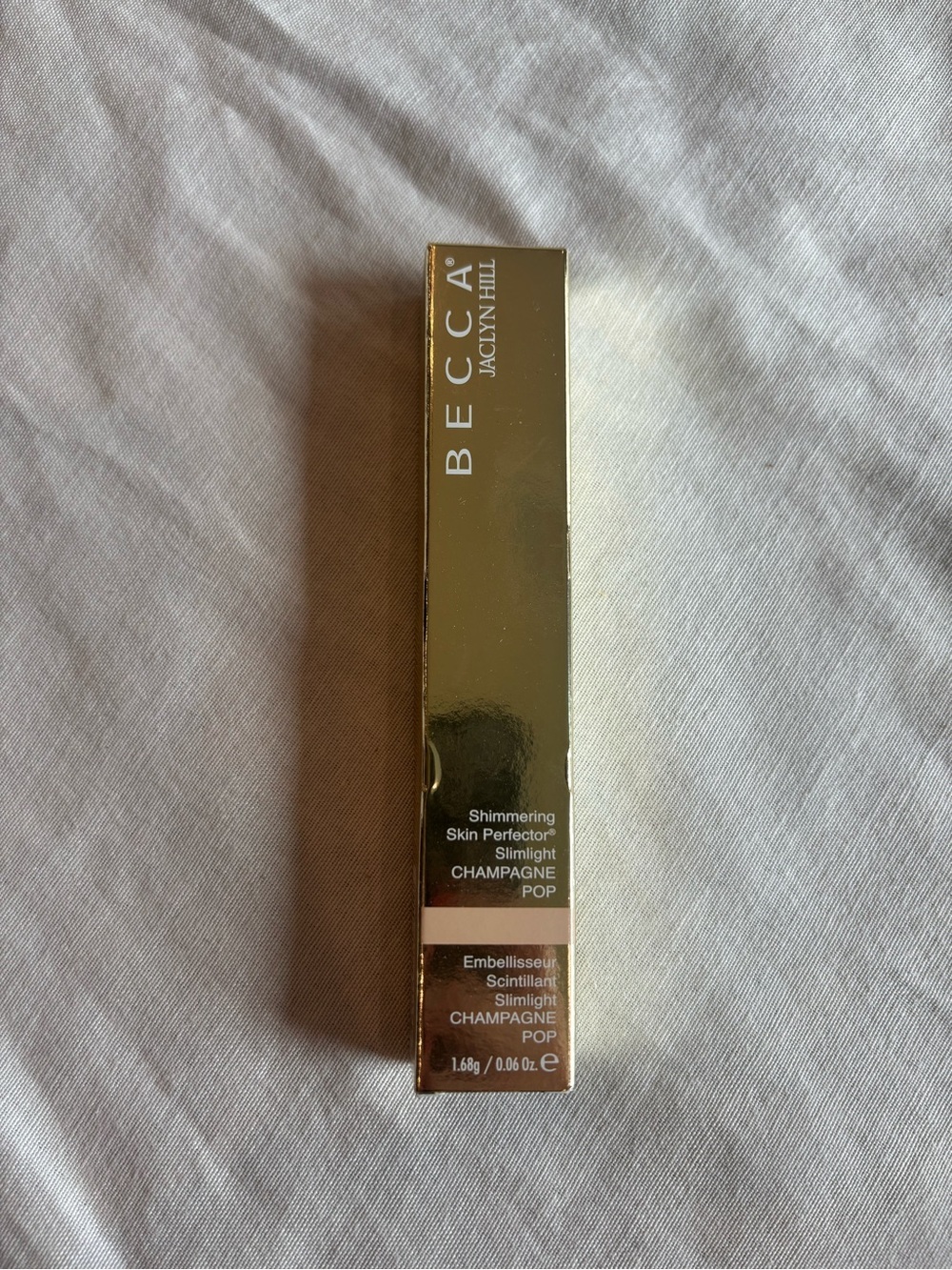 BECCA Shimmering Skin Perfector Slimlight CHAMPAGNE POP NEW highlighter
